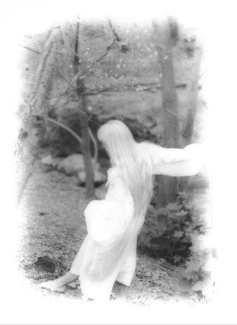 woman dreaming in the forest photo